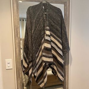 Beautiful BCBG boho shawl sweater. It’s very soft and warm; actually never worn.